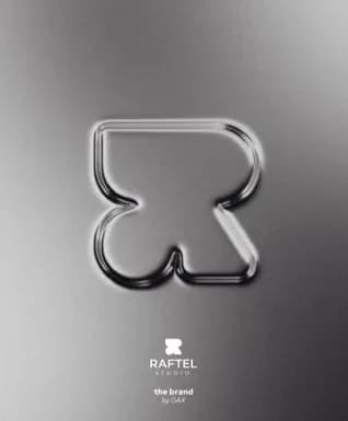 The Raftel studio’s R, a thick chrome letter pressed into brushed metal.