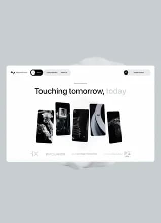 A futuristic robotics site: “Touching tomorrow, today” over a row of phones, on pale gray.